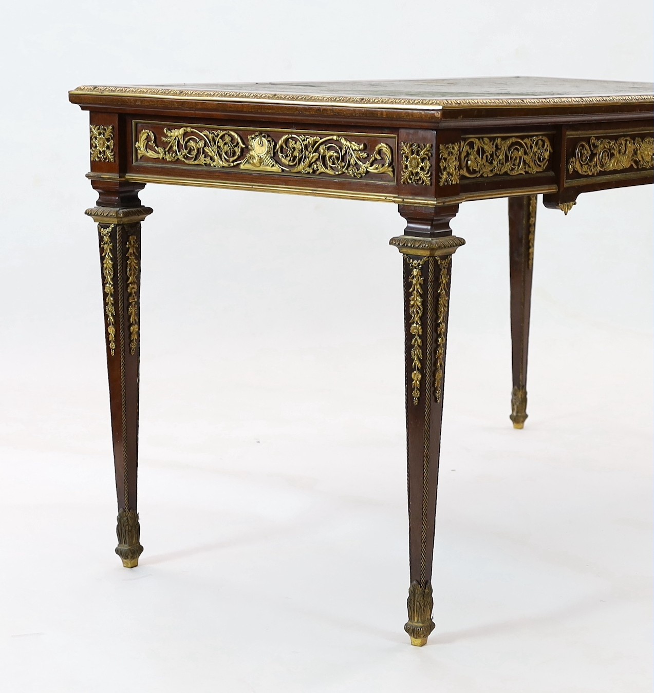 Francois Linke. A Louis XVI style gilt bronze mounted mahogany bureau plat, width 129cm depth 66cm height 74cm